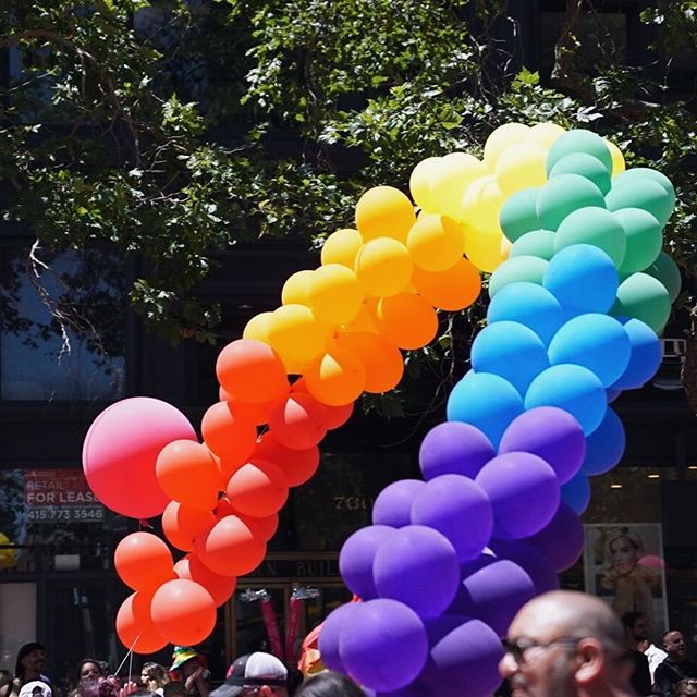 Photo of rainbow colored balloons at San Francisco Pride parade