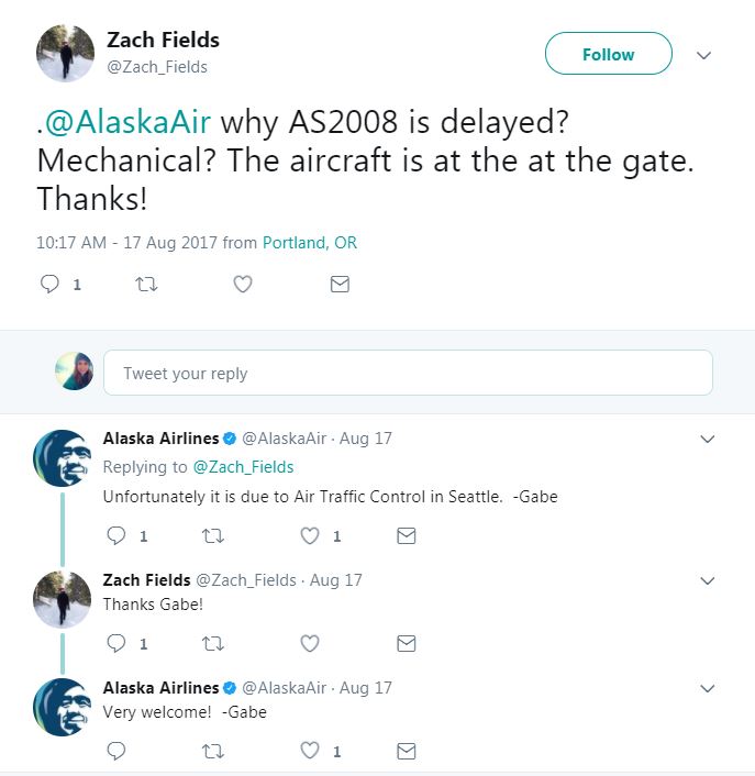 This is a photo of a Twitter interaction between an Alaska Airlines social care agent and a guest, explaining that their flight is delayed due to ATC.
