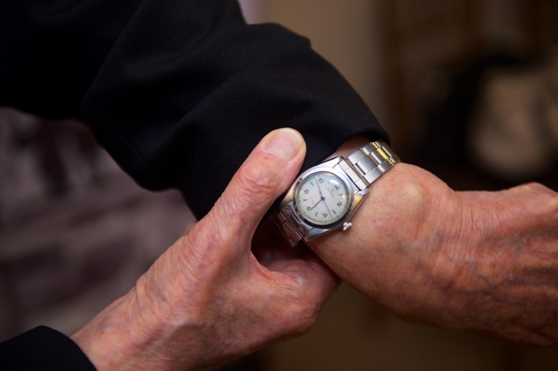 This is a close up photo of a silver Rolex watch on Elgen Long's left arm.